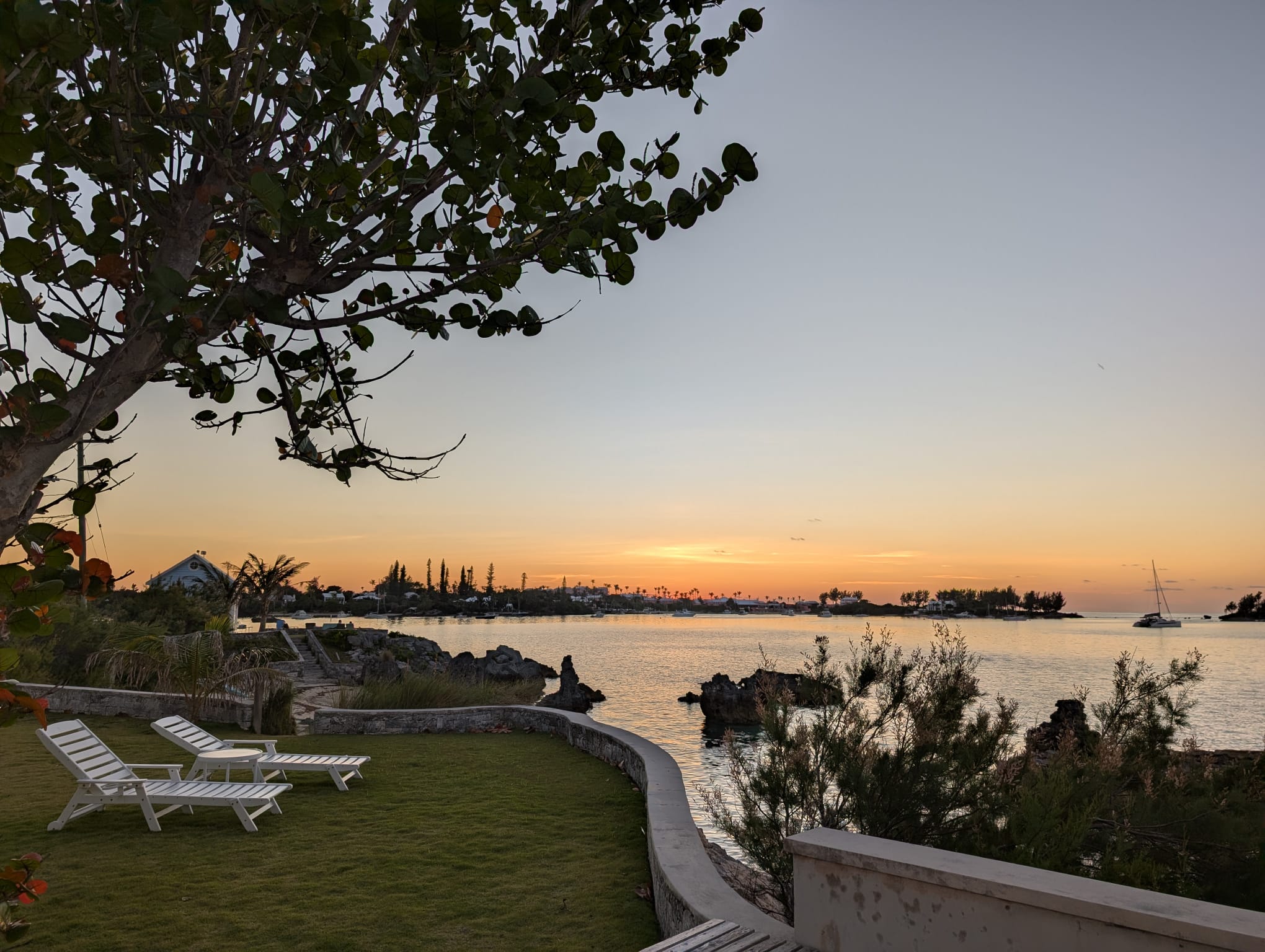 Loungers on the lawn at sunset
